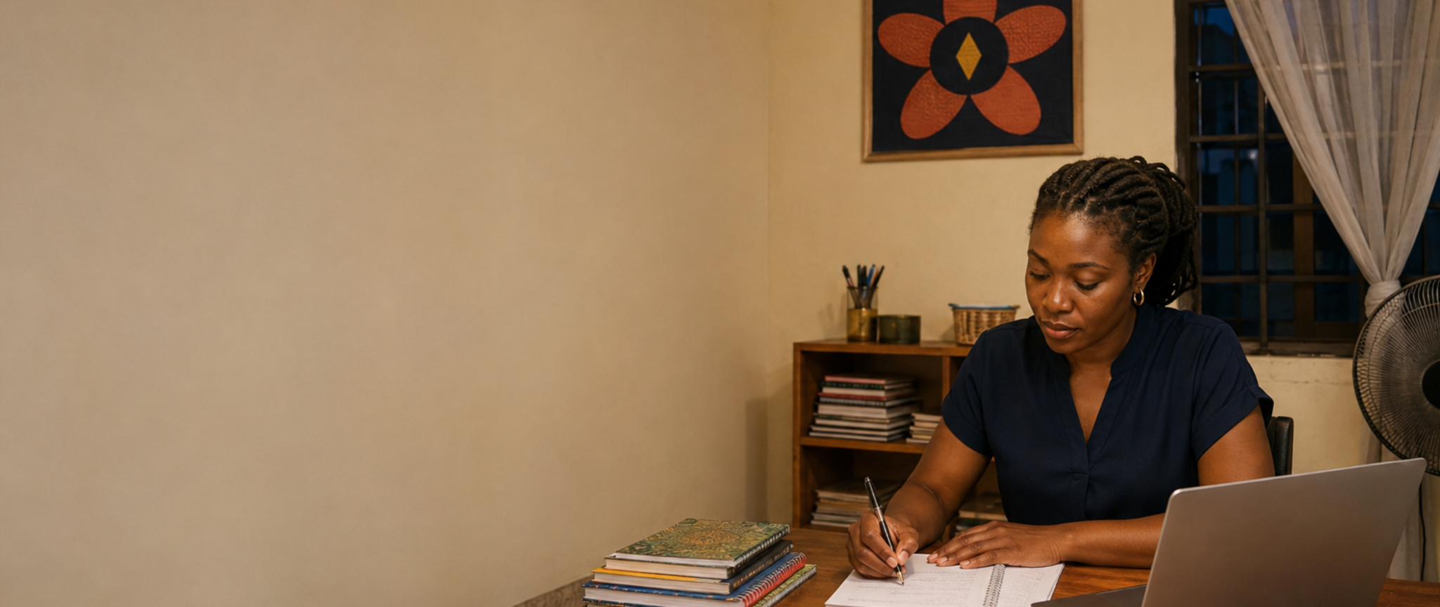 A Blooming Adventurers team member planning at a desk